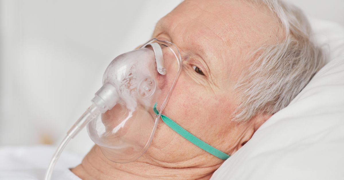 Man with an oxygen mask on